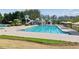 Resort-style pool and slide area offer endless summer fun in a luxurious setting at 6103 Menlow Ct, Cumming, GA 30041