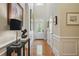 Bright entryway featuring hardwood floors, decorative molding, and stylish decor at 104 Glentown Way, Sandy Springs, GA 30328