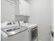 Convenient laundry room with front-load washer and dryer at 104 Glentown Way, Sandy Springs, GA 30328