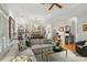 Open concept living room with built-in bookshelves, dining area, and comfortable furniture at 104 Glentown Way, Sandy Springs, GA 30328