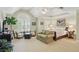 Spacious main bedroom with sitting area, vaulted ceilings, and plantation shutters at 104 Glentown Way, Sandy Springs, GA 30328
