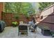 Outdoor patio with comfortable seating and a privacy fence at 104 Glentown Way, Sandy Springs, GA 30328