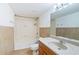 Traditional bathroom showcasing tile flooring, shower-tub combo, and single sink vanity at 2870 Pharr Court South Nw # 1704, Atlanta, GA 30305