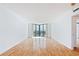 Bright living room with hardwood floors and corner windows offering city views at 2870 Pharr Court South Nw # 1704, Atlanta, GA 30305