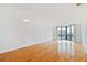Bright living room with hardwood floors and corner windows offering city views at 2870 Pharr Court South Nw # 1704, Atlanta, GA 30305