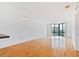 Bright living room with hardwood floors and corner windows offering city views at 2870 Pharr Court South Nw # 1704, Atlanta, GA 30305