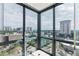 Corner view looking over the city skyline from a unit with floor to ceiling windows at 2870 Pharr Court South Nw # 1704, Atlanta, GA 30305