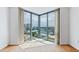 Corner window showcasing city view from a unit with hardwood floors and lots of natural light at 2870 Pharr Court South Nw # 1704, Atlanta, GA 30305