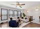 Spacious living area filled with natural light and comfortable seating offers a perfect spot for relaxation at 371 Northaven Ave, Suwanee, GA 30024
