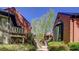 Charming townhomes with brick exteriors, private balconies, and beautifully landscaped walkways at 470 Ansley Walk Ne Ter, Atlanta, GA 30309
