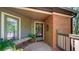 Welcoming front porch adorned with a wreath and cozy bench seating at 470 Ansley Walk Ne Ter, Atlanta, GA 30309