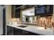 Modern kitchen featuring marble countertops and stainless steel appliances at 470 Ansley Walk Ne Ter, Atlanta, GA 30309