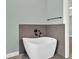 Modern bathroom showcasing a freestanding tub and tiled accent wall at 635 Hickory Nobb, Sugar Hill, GA 30518