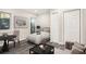 Cozy bedroom featuring a full-sized bed and an area for seating at 1022 Mariners Ct, Stone Mountain, GA 30083