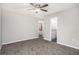 Spacious bedroom featuring a walk-in closet and adjoining bathroom at 1022 Mariners Ct, Stone Mountain, GA 30083