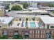 Rooftop pool area with lounge seating and umbrellas, offering an outdoor recreational space for residents at 201 W Ponce De Leon Ave # 402, Decatur, GA 30030