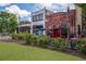 Neighborhood restaurants and shops with outdoor seating and vibrant storefronts at 201 W Ponce De Leon Ave # 402, Decatur, GA 30030