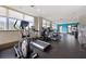 Bright community gym filled with treadmills and machines at 201 W Ponce De Leon Ave # 402, Decatur, GA 30030