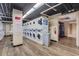 A clean laundry room featuring several modern washing machines and dryers for residents' convenience at 300 Peachtree Ne St # 22N, Atlanta, GA 30308