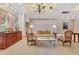 A seating area in a sophisticated lobby with stylish furniture, lamps, and chandelier lighting at 300 Peachtree Ne St # 22N, Atlanta, GA 30308