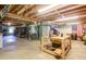 Large unfinished basement with exposed ceiling and concrete flooring at 4265 Hurt Bridge Rd, Cumming, GA 30028