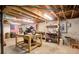 Unfinished basement with workbench, shelving, and American flag at 4265 Hurt Bridge Rd, Cumming, GA 30028