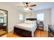 Bedroom with hardwood floors, and plenty of natural light through the windows at 4265 Hurt Bridge Rd, Cumming, GA 30028