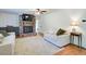 Bright living room featuring a brick fireplace, shiplap walls, and neutral-toned furniture for a cozy feel at 4265 Hurt Bridge Rd, Cumming, GA 30028