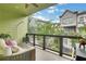 Inviting balcony featuring comfortable seating, stylish decor, and a view of the surrounding neighborhood at 758 Cady Way, Atlanta, GA 30312