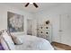 Bright bedroom showcasing a lovely accent painting and ample storage space at 758 Cady Way, Atlanta, GA 30312