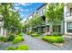 Inviting townhome community with lush greenery and landscaped pathways in a tranquil setting at 758 Cady Way, Atlanta, GA 30312