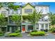 Charming townhome features colorful exteriors, quaint front yards, and private balconies on a sunny day at 758 Cady Way, Atlanta, GA 30312