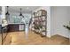Modern kitchen boasts stainless steel appliances, a bar area, and hardwood floors at 758 Cady Way, Atlanta, GA 30312