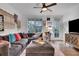 Relaxing living room with plush sectional sofa, decorative textiles, and bright windows at 758 Cady Way, Atlanta, GA 30312