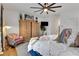 Bright main bedroom featuring a comfortable bed, stylish decor, and a cozy sitting area at 758 Cady Way, Atlanta, GA 30312