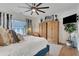 Spacious main bedroom with a comfortable bed, decorative accents, and large wardrobe at 758 Cady Way, Atlanta, GA 30312