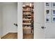 Well-organized pantry with adjustable shelves, storage drawers, and ample space at 758 Cady Way, Atlanta, GA 30312