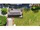 Aerial view of property showcasing expansive, fenced backyard and deck with pergola at 77 Glenn Se St, Atlanta, GA 30312