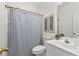 Clean bathroom with shower and tub combination, modern fixtures, and decorative art at 77 Glenn Se St, Atlanta, GA 30312