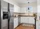 Modern kitchen with stainless steel appliances, ample cabinets, and granite countertops at 77 Glenn Se St, Atlanta, GA 30312