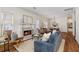 Stylish living room with fireplace, hardwood floors, and comfortable seating at 77 Glenn Se St, Atlanta, GA 30312