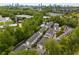 Scenic aerial view of townhomes with a skyline in the distance at 1356 Peter Haughton Nw Way, Atlanta, GA 30318