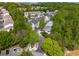 Community aerial view showcasing homes, trees, pool, and parking at 1356 Peter Haughton Nw Way, Atlanta, GA 30318