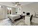 Modern bedroom with a desk, workspace, and neutral color scheme at 1356 Peter Haughton Nw Way, Atlanta, GA 30318