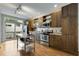 Stylish kitchen with stainless steel appliances, center island, and hardwood floors at 1356 Peter Haughton Nw Way, Atlanta, GA 30318