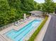 Aerial view of a community pool surrounded by trees and lounge chairs at 1356 Peter Haughton Nw Way, Atlanta, GA 30318