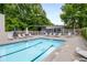 Well-maintained pool with lots of lounge chairs for residents' relaxation at 1356 Peter Haughton Nw Way, Atlanta, GA 30318