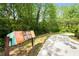 Scenic walking trail surrounded by lush greenery and trees, perfect for outdoor enthusiasts at 1356 Peter Haughton Nw Way, Atlanta, GA 30318