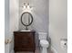 Charming half bath with decorative mirror and sink at 4035 Regal Oaks Dr, Suwanee, GA 30024