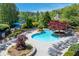 Take a dip in the sparkling community pool, complete with lounge chairs and lush landscaping at 4035 Regal Oaks Dr, Suwanee, GA 30024